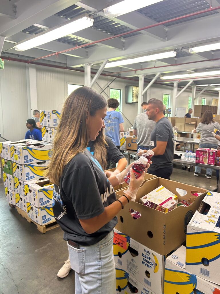 daphne spensieri volunteers with northeastern insurance