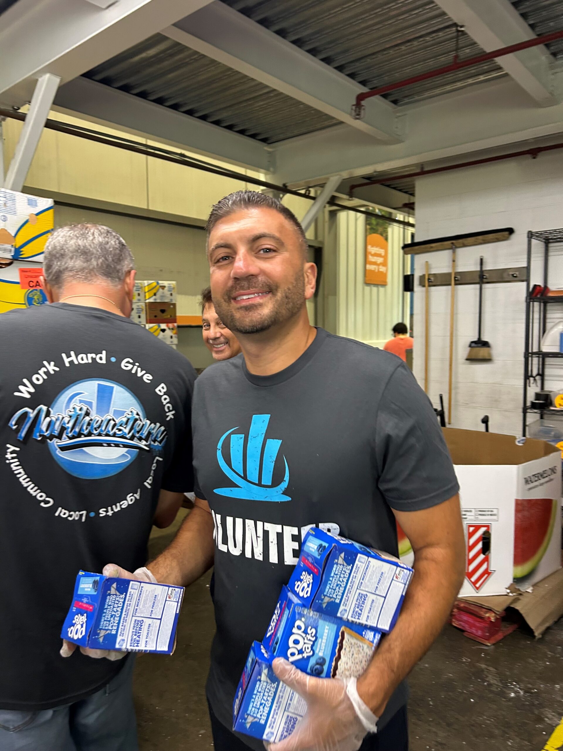 mike venezio volunteers at regional food bank