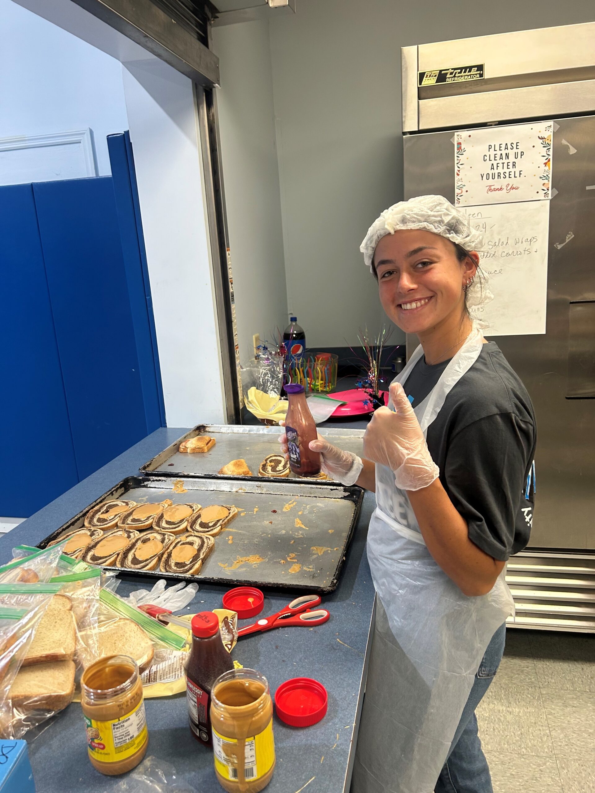 northeastern insurance intern mia aquino prepping meals for salvation army