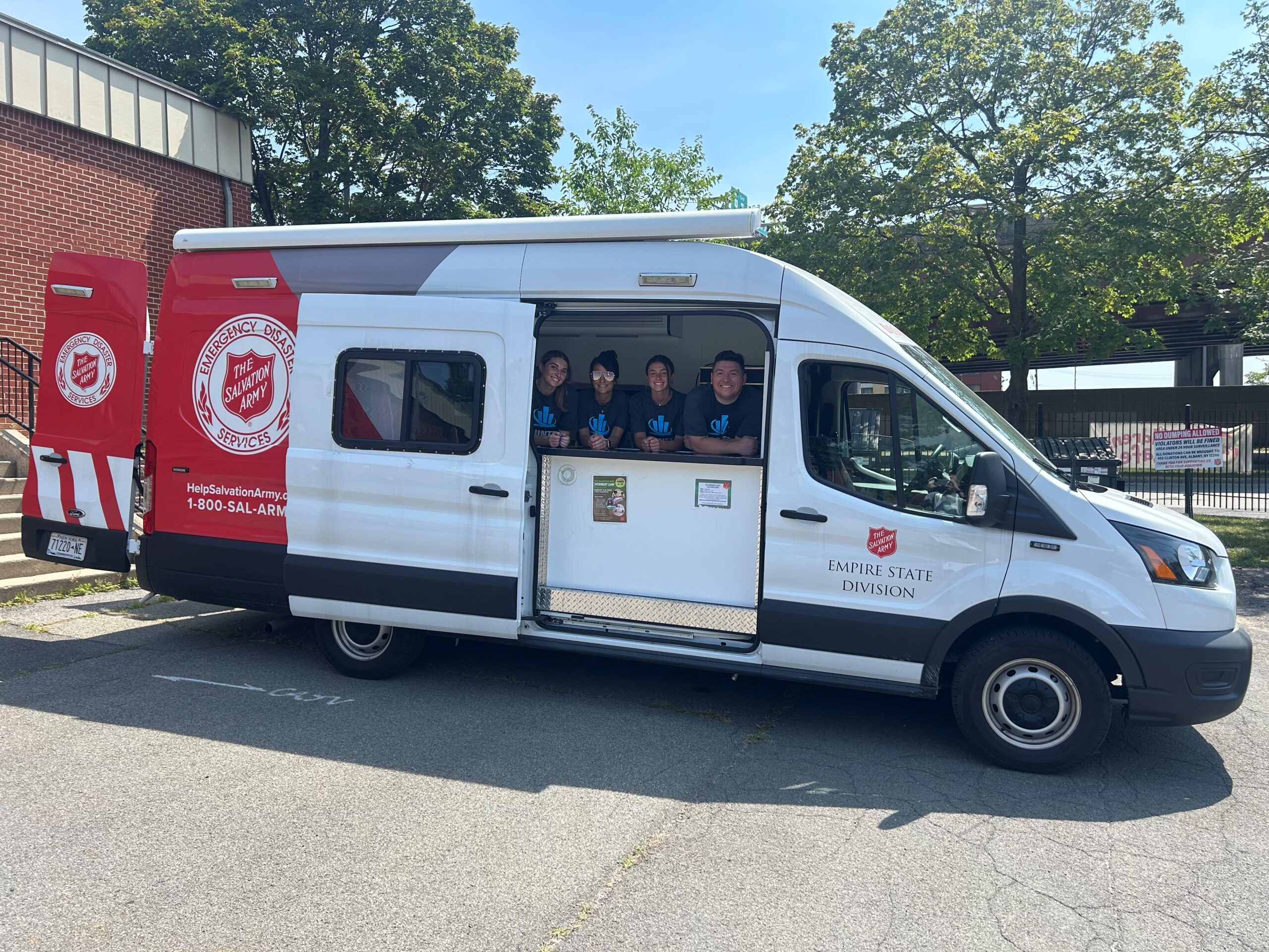 salvation army of albany northeastern insurance prepping meals for delivery in community