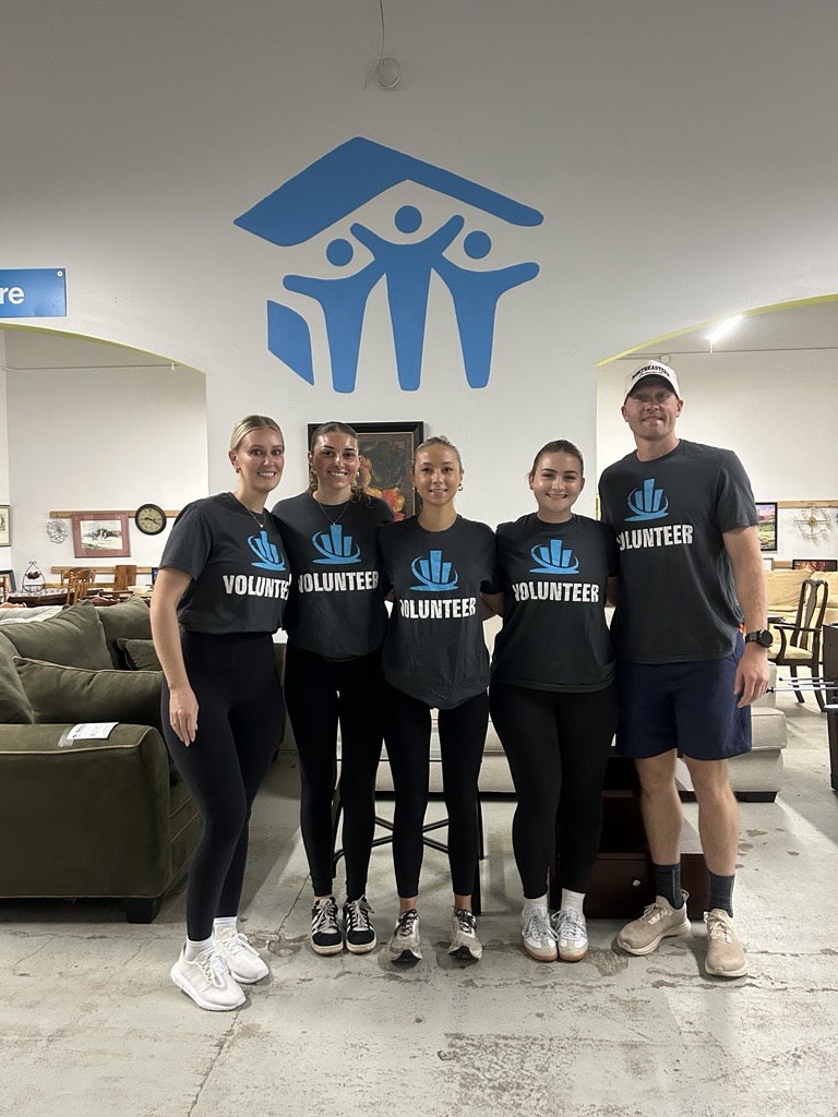 northeastern insurance volunteers at habitat for humanity restore program