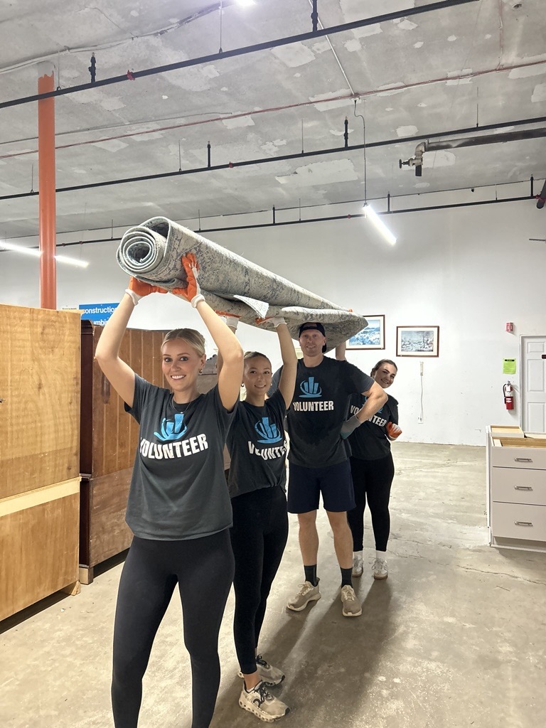 northeastern insurance volunteers at habitat for humanity restore program
