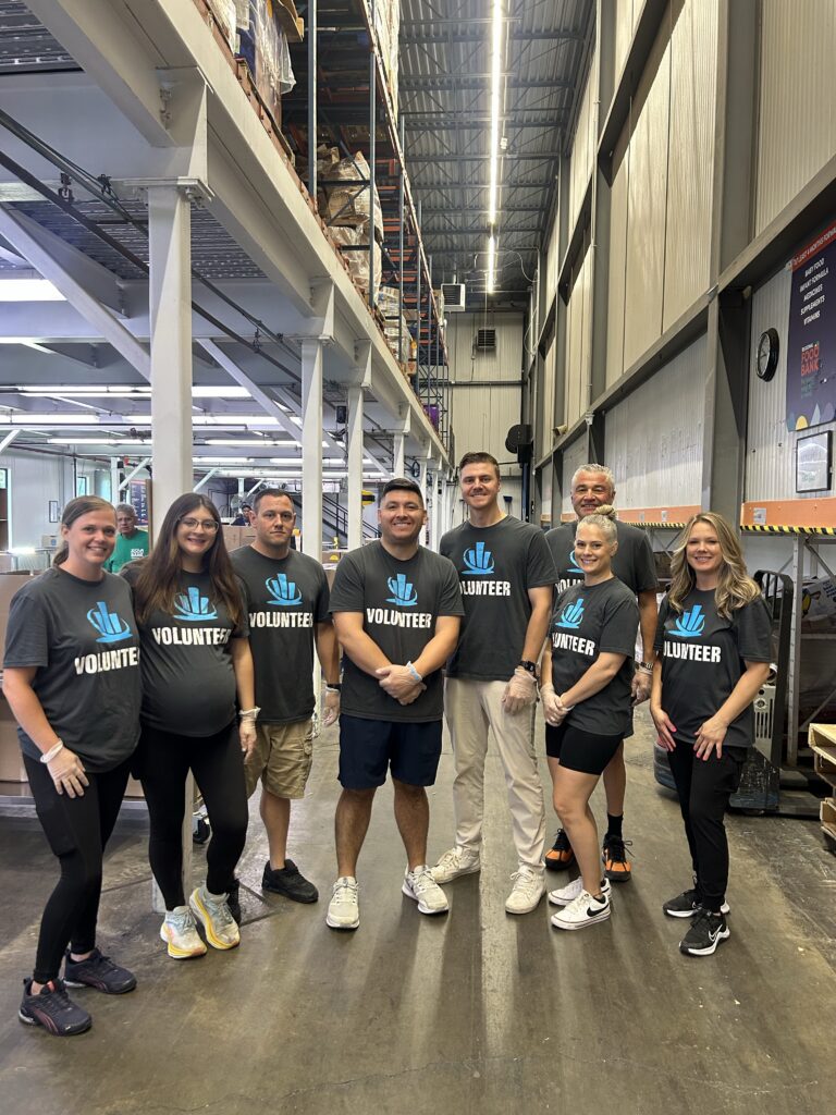 northeastern insurance volunteers at regional food bank in latham, ny