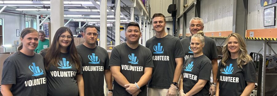northeastern insurance volunteers at regional food bank in latham, ny